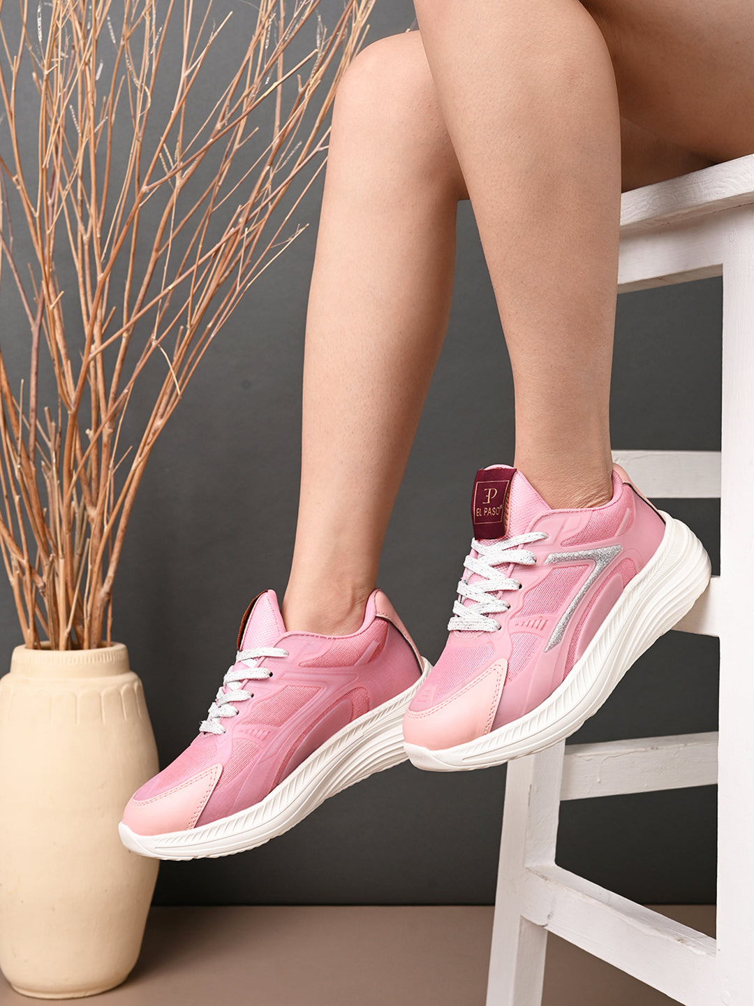 Solid Round Toe Sneakers for Women in pink and white with a simple, sleek design for a versatile and stylish look.