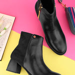 women black zip ankle length boots with a smooth leather front, suede back, block heel, pointed toe
