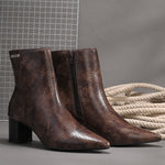 brown textured ankle boots with a sleek snakeskin pattern and a block heel design