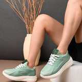 Solid Round Toe Sneakers for Women in green and white with a simple, sleek design for a versatile and stylish look.