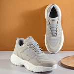 This is a Men grey and white Faux Leather Casual sneaker with a white heel and lace-up design, offering a sleek and modern look.