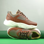 brown and grey mesh Men's casual sneakers with a chunky white sole, offering a stylish and comfortable look.