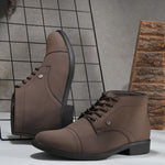 Brown leather lace-up boots with cap toe, sleek design, metal eyelets, and a small brand logo near the ankle.
