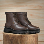 A Men's Ankle Length Block Heel boots with a side zipper, pull-tab at the back, and a low block heel.