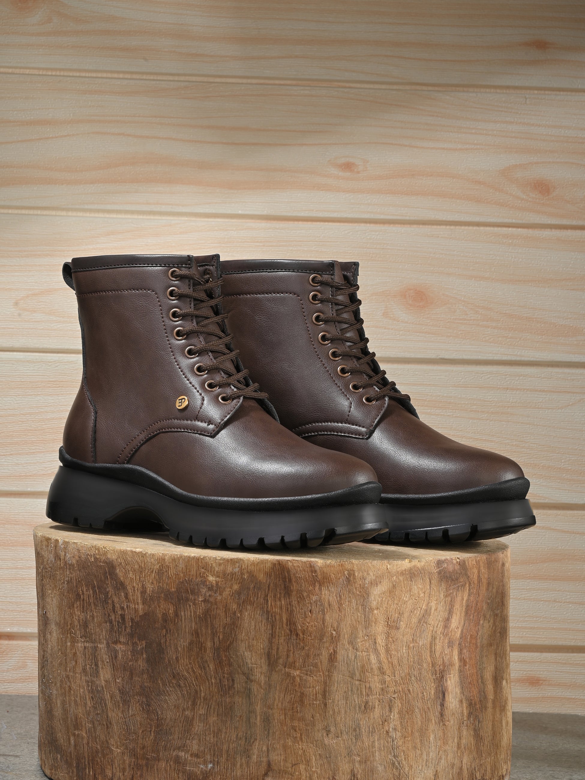 A Men's Ankle Length Block Heel boots with a side zipper, pull-tab at the back, and a low block heel.