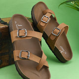 Women’s one-toe flats with a cork sole, silver buckles, and a casual slip-on design.