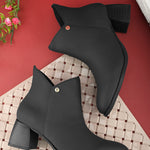 Black ankle boots for women with a block heel and a sleek gold accent, perfect for adding a touch of elegance to any outfit.