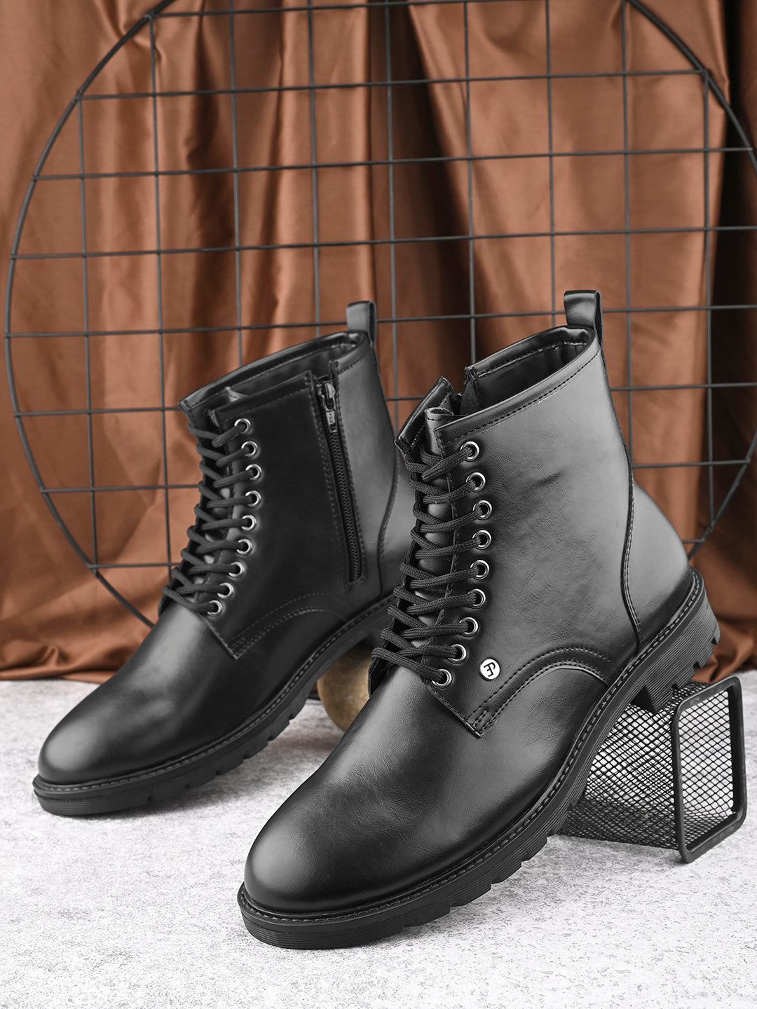 A Men's Ankle Length Block Heel boots with a side zipper, pull-tab at the back, and a low block heel.