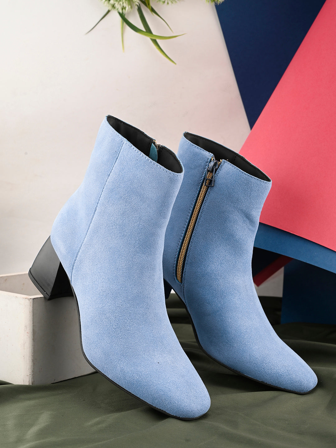 Suede Ankle Boots with a sleek design and block heel, paired with Blue Faux Leather Boots for Women.