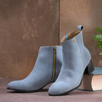 Light blue Suede ankle boots for women with a block heel and a sleek, minimalist design.
