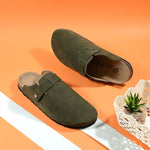Olive suede slip-on clog with a black rubber sole and adjustable strap.