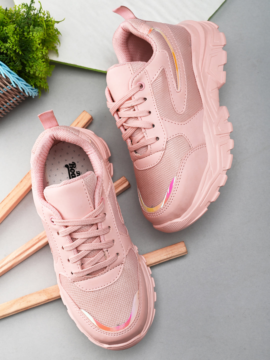 Pink Lace-Up Women Sneakers with a trendy design for comfort and style.