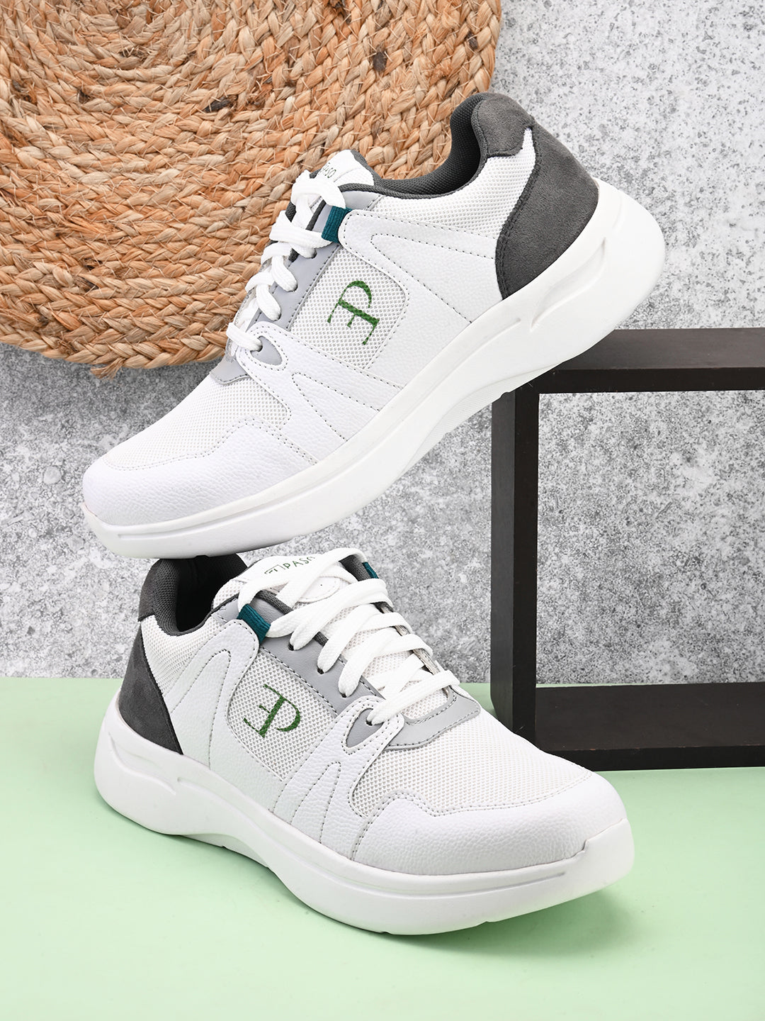 Black & White colour Men's lace-up casual athletic shoes with white laces.