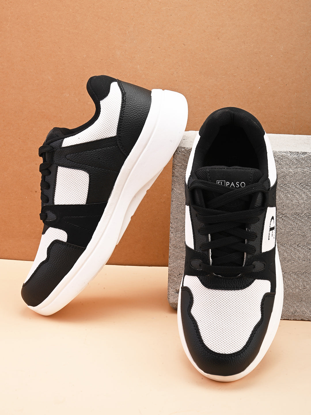 Black & White colour Men's lace-up casual athletic shoes with white laces.