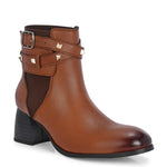Brown leather ankle boots with studded straps and a buckle design.