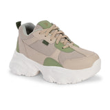 Beige and green chunky sneaker with a textured sole and modern design