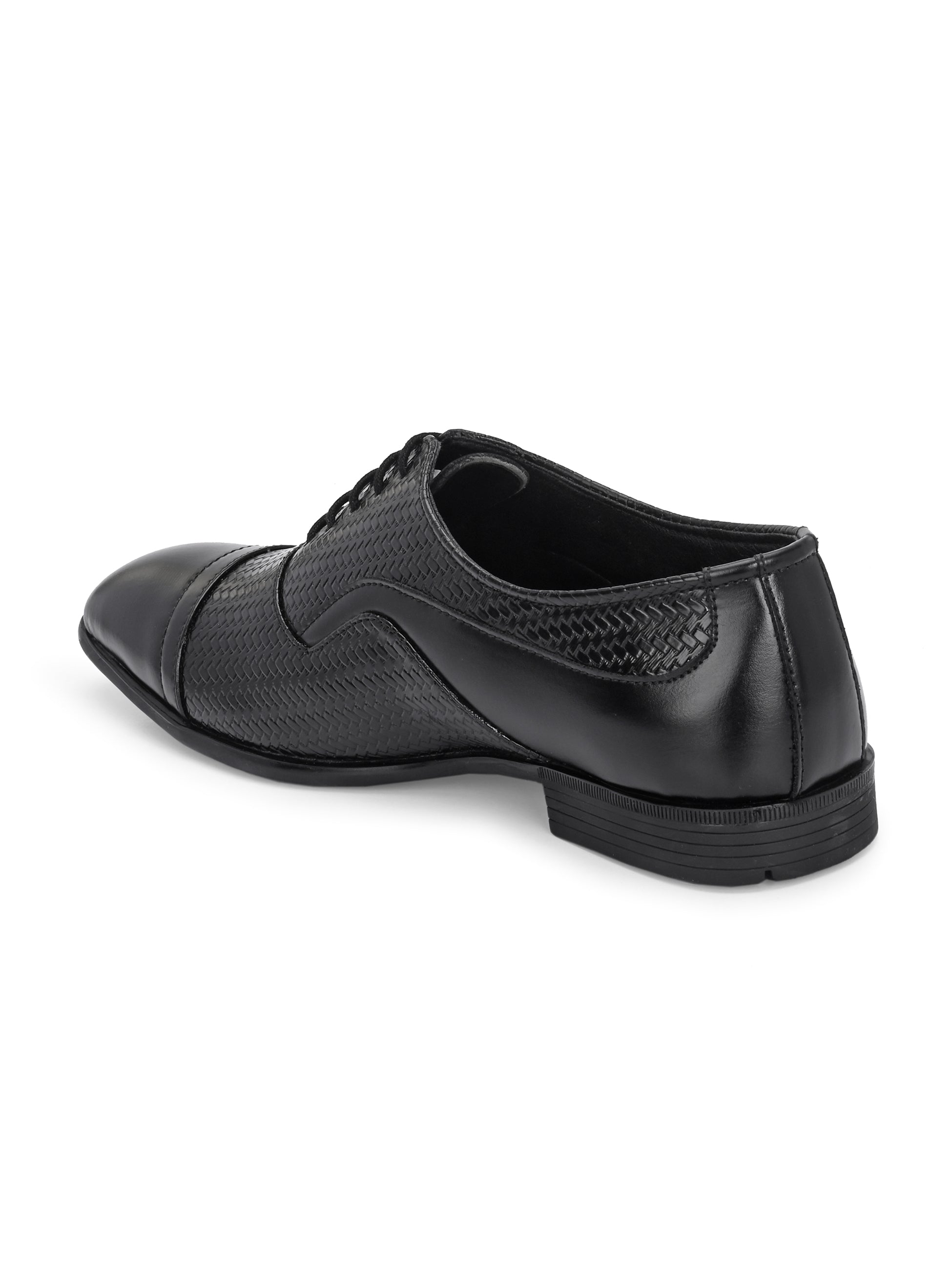 A black formal shoe with a textured pattern, lace-up design, and smooth toe cap.