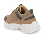 A Sneaker in Beige color with green texture and brown lace-up