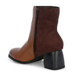 women black zip ankle length boots with a smooth leather front, suede back, block heel, pointed toe