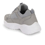 a grey and white sneaker with white heel and lace-up design