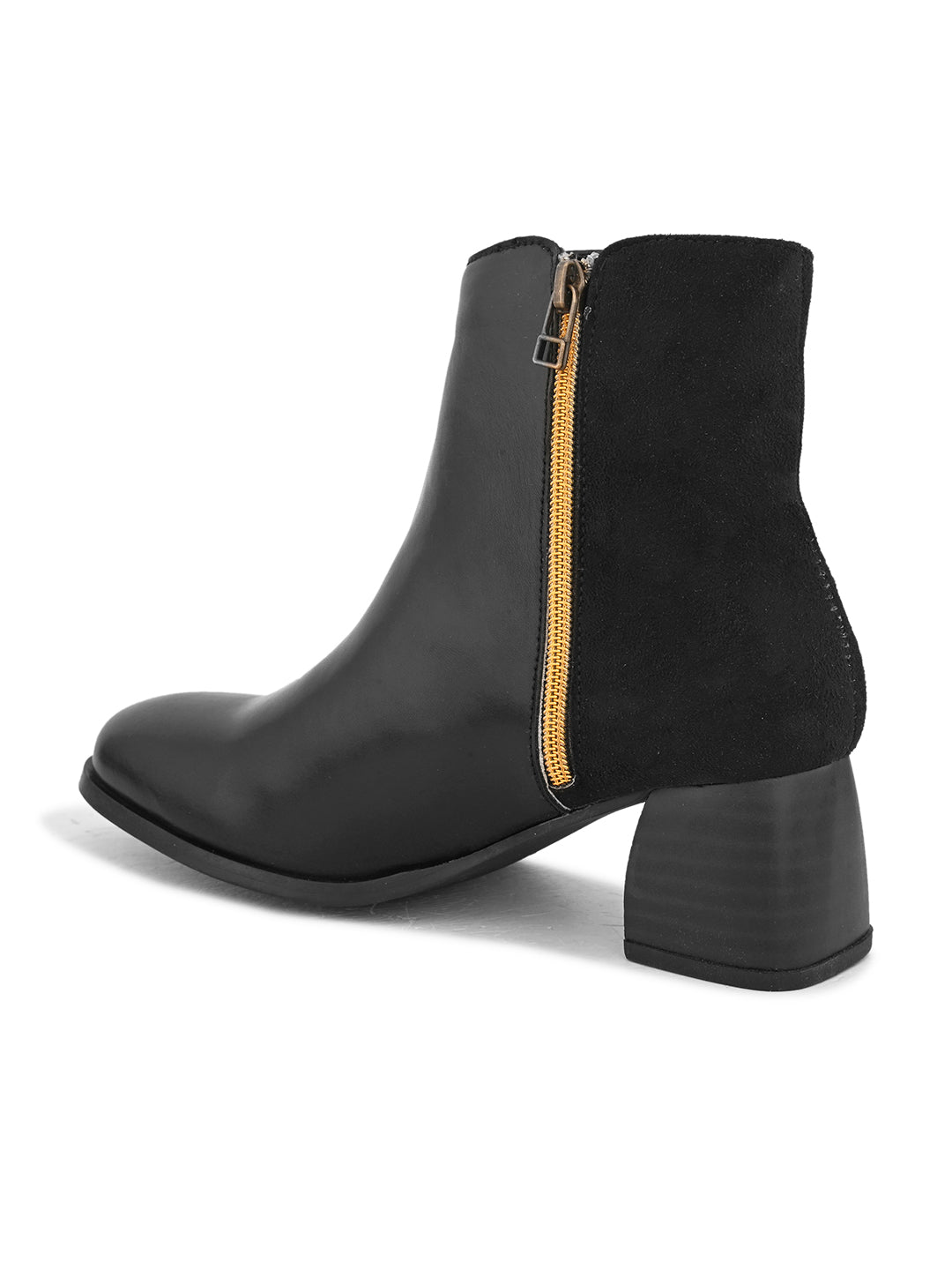Black ankle boot with a smooth leather front, suede back, block heel, pointed toe with a zip