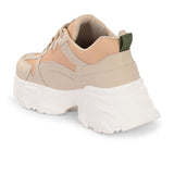 Beige chunky sneakers with a textured sole and mesh accents.