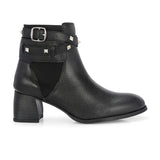 Black leather ankle boots with studded straps and a buckle design.