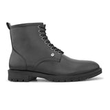 A sleek black patent leather Chelsea lace-up boot with a side zipper, pull-tab at the back, and a low block heel.