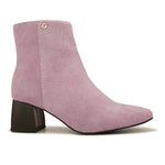 Light pink suede ankle boots with a sleek design and block heel.