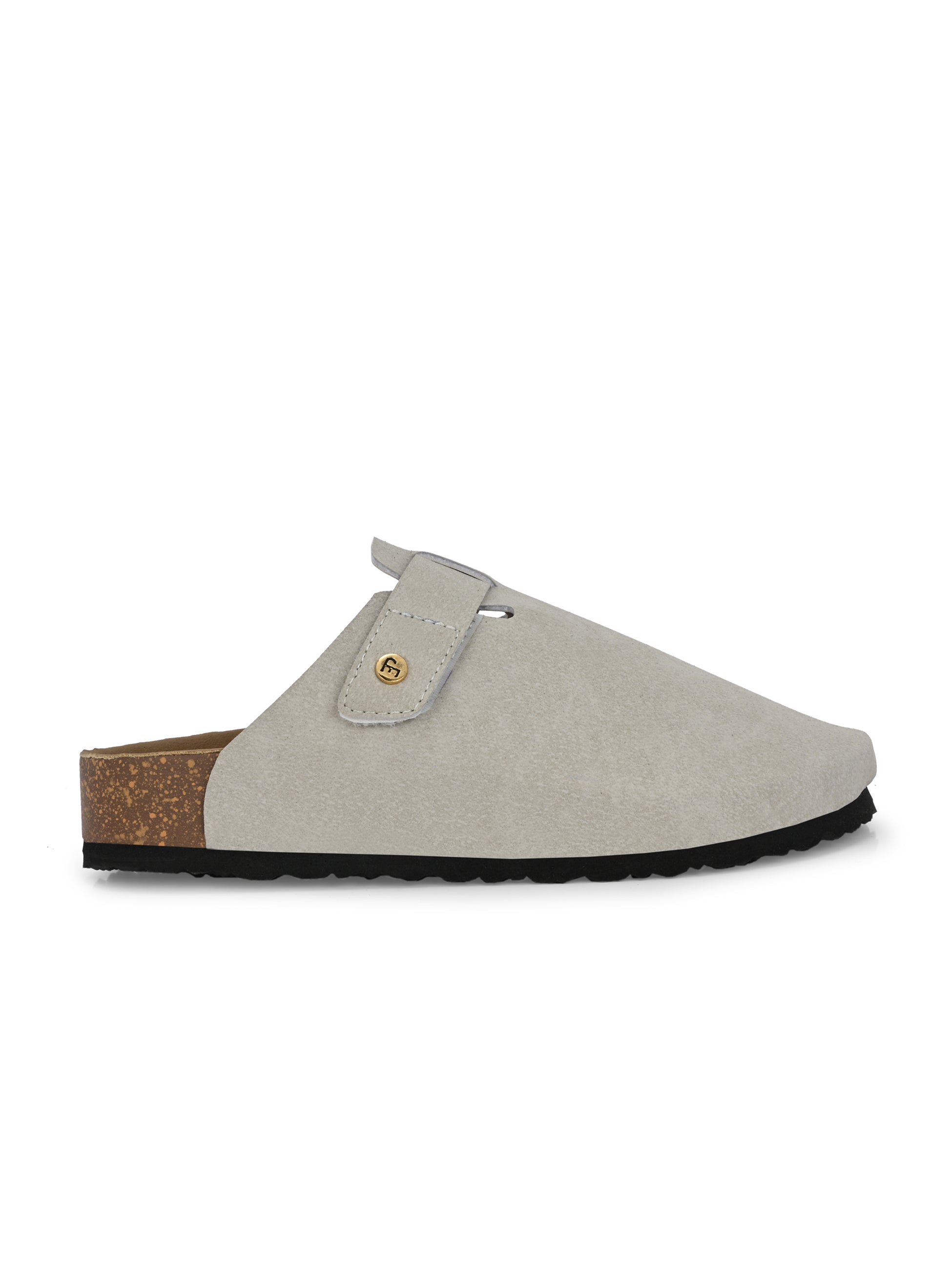Nude suede slip-on clog with a black rubber sole and adjustable strap.