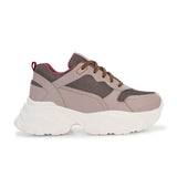 A chunky sneaker with a brown mesh upper, pink leather panels, brown laces, and a thick white sole.
