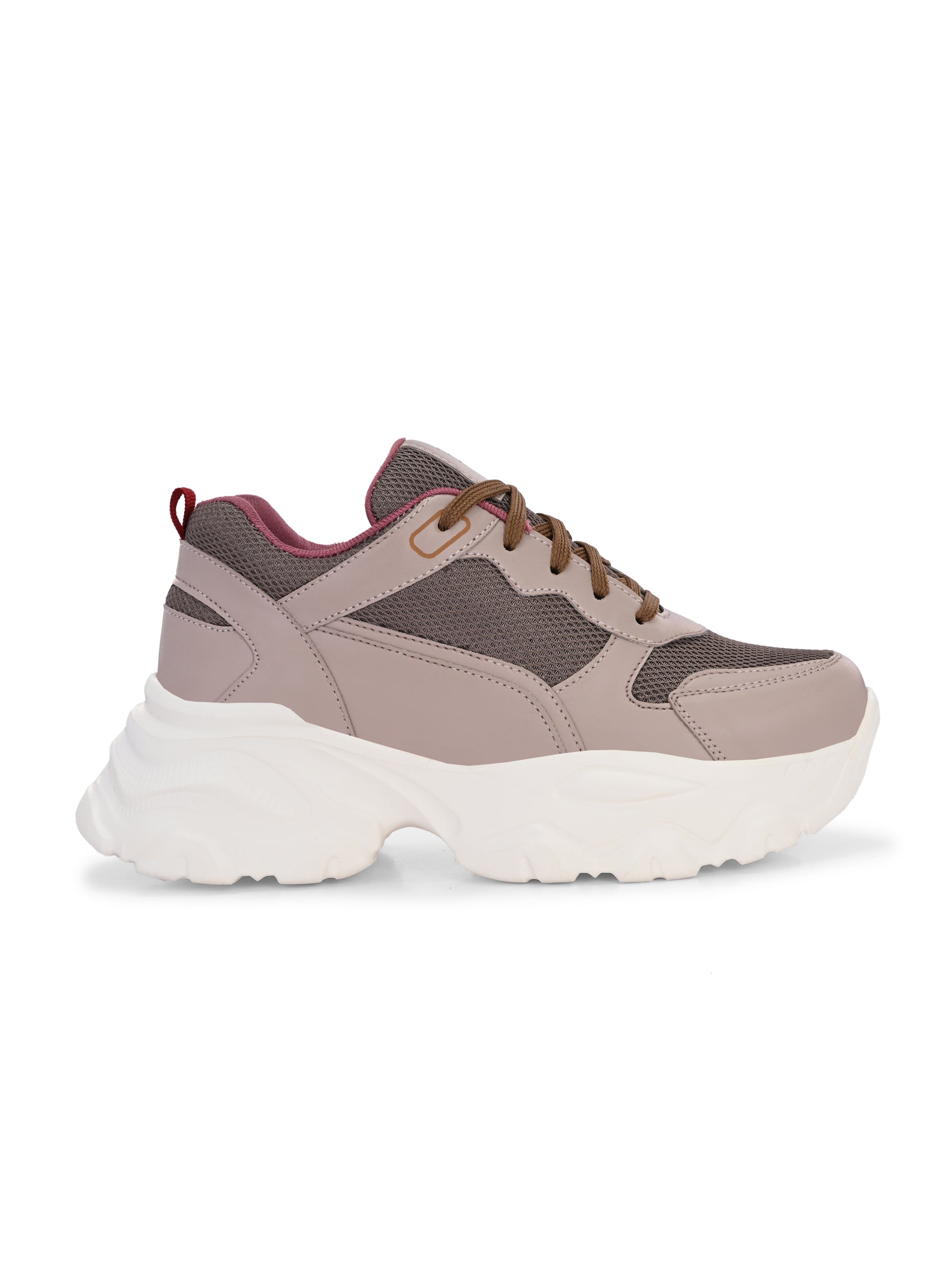 A chunky sneaker with a brown mesh upper, pink leather panels, brown laces, and a thick white sole.