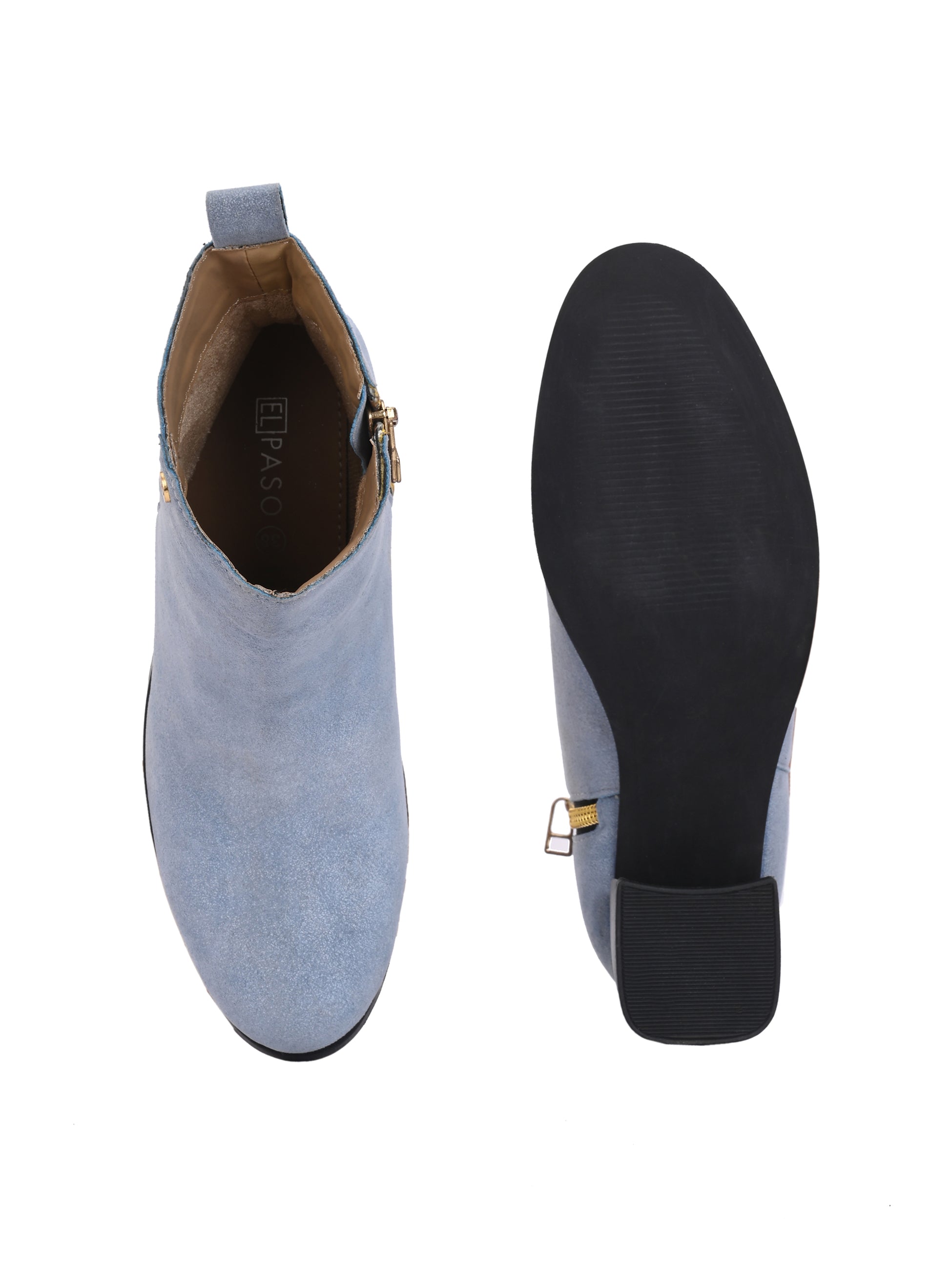 Light blue heigh top boot with a block heel and a sleek, minimalist design.