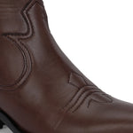 Brown ankle boots with intricate decorative stitching, featuring a slip-on design.