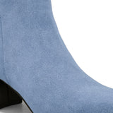 Light blue suede ankle boots with a sleek design and block heel.