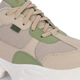Beige and green chunky sneaker with a textured sole and modern design