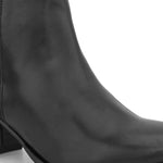 Black ankle boot with a smooth leather front, suede back, block heel, pointed toe with a zip