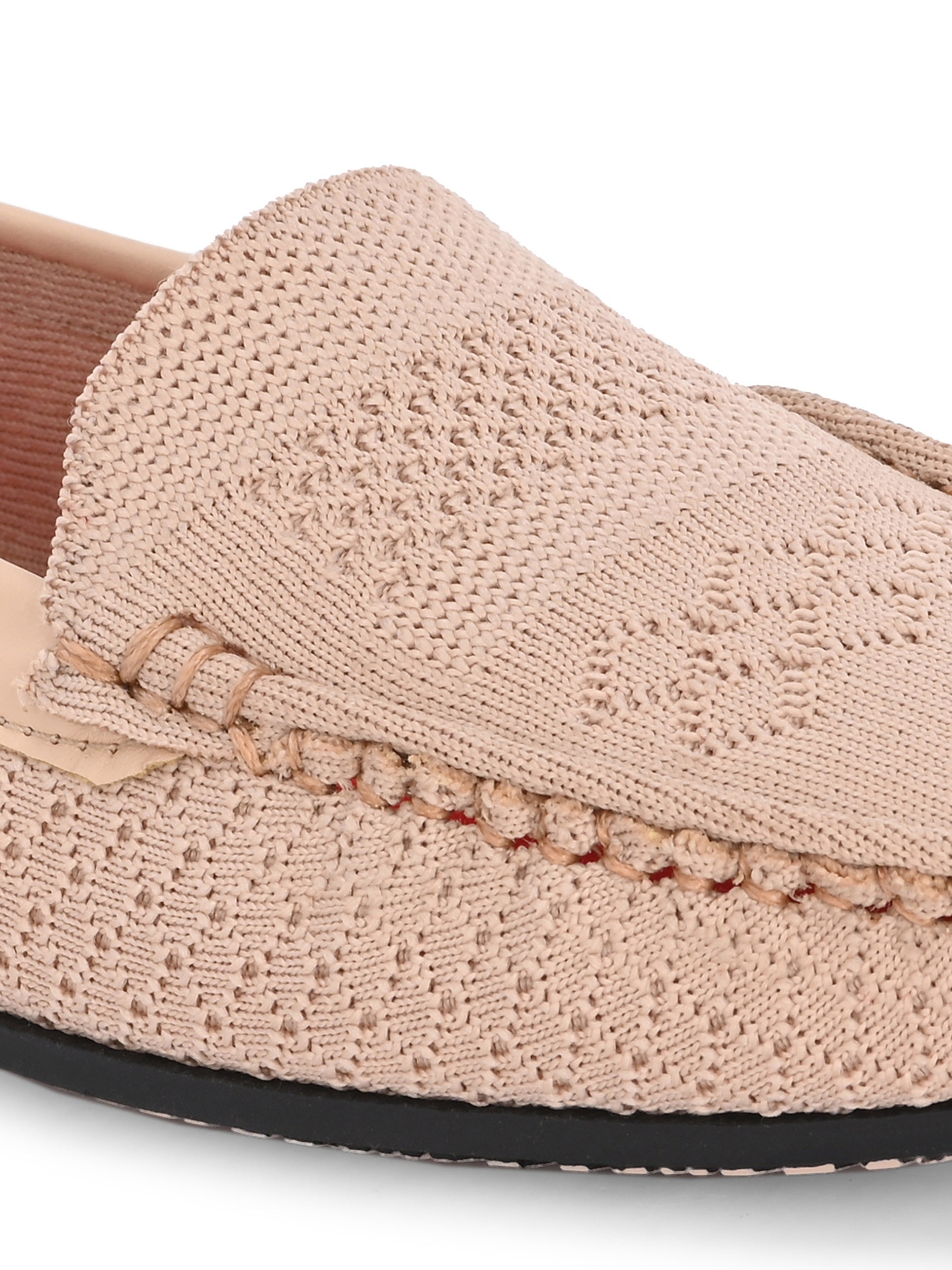 Stylish pink woven loafer with textured design