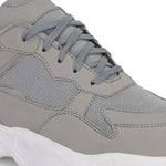 a grey and white sneaker with white heel and lace-up design