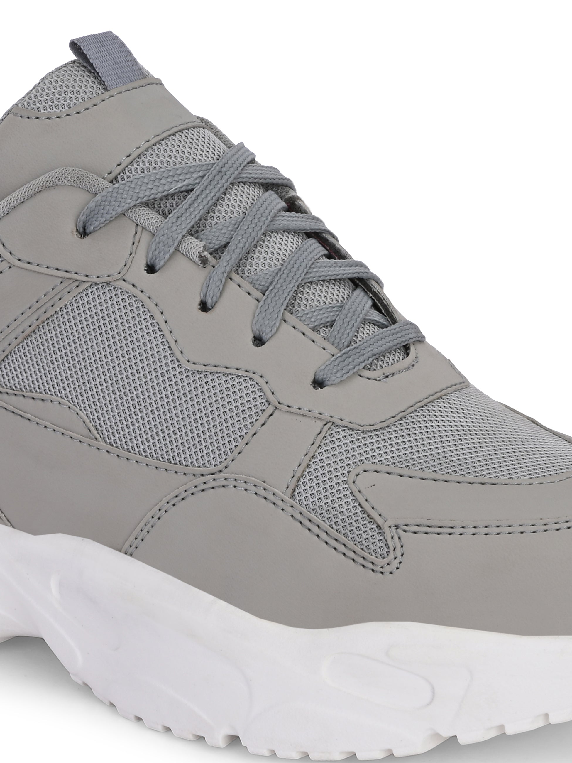 a grey and white sneaker with white heel and lace-up design