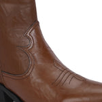 Tan ankle boots with intricate decorative stitching, featuring a slip-on design.