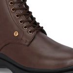 A sleek brown leather Chelsea lace-up boot with a side zipper, pull-tab at the back, and a low block heel.