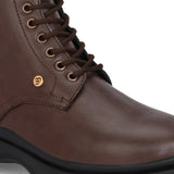 A sleek brown leather Chelsea lace-up boot with a side zipper, pull-tab at the back, and a low block heel.