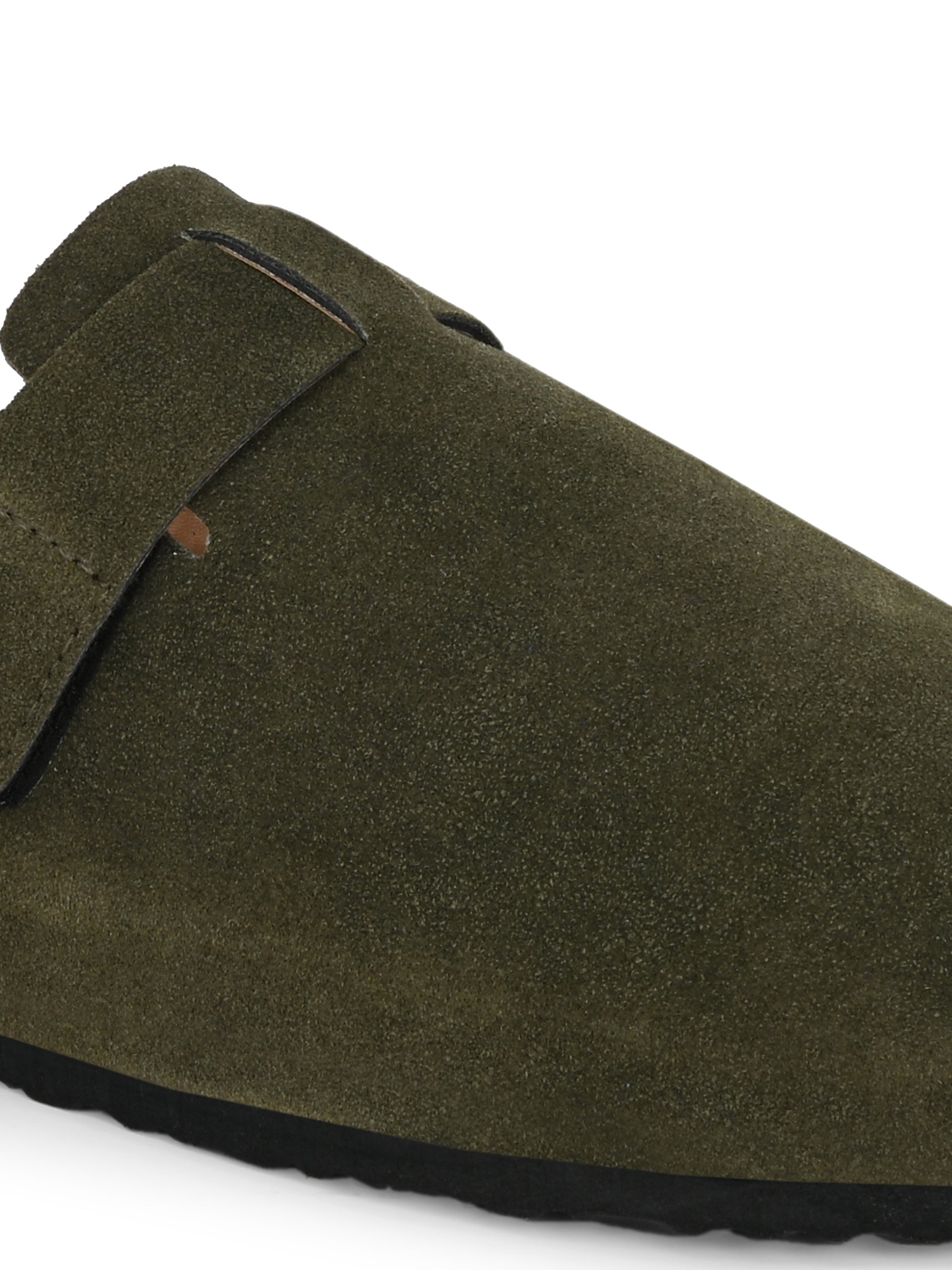 Olive suede slip-on clog with a black rubber sole and adjustable strap.