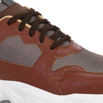 Men's brown and grey mesh sneakers with a chunky white sole.