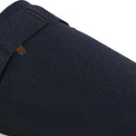 Blue suede slip-on clog with a black rubber sole and adjustable strap.