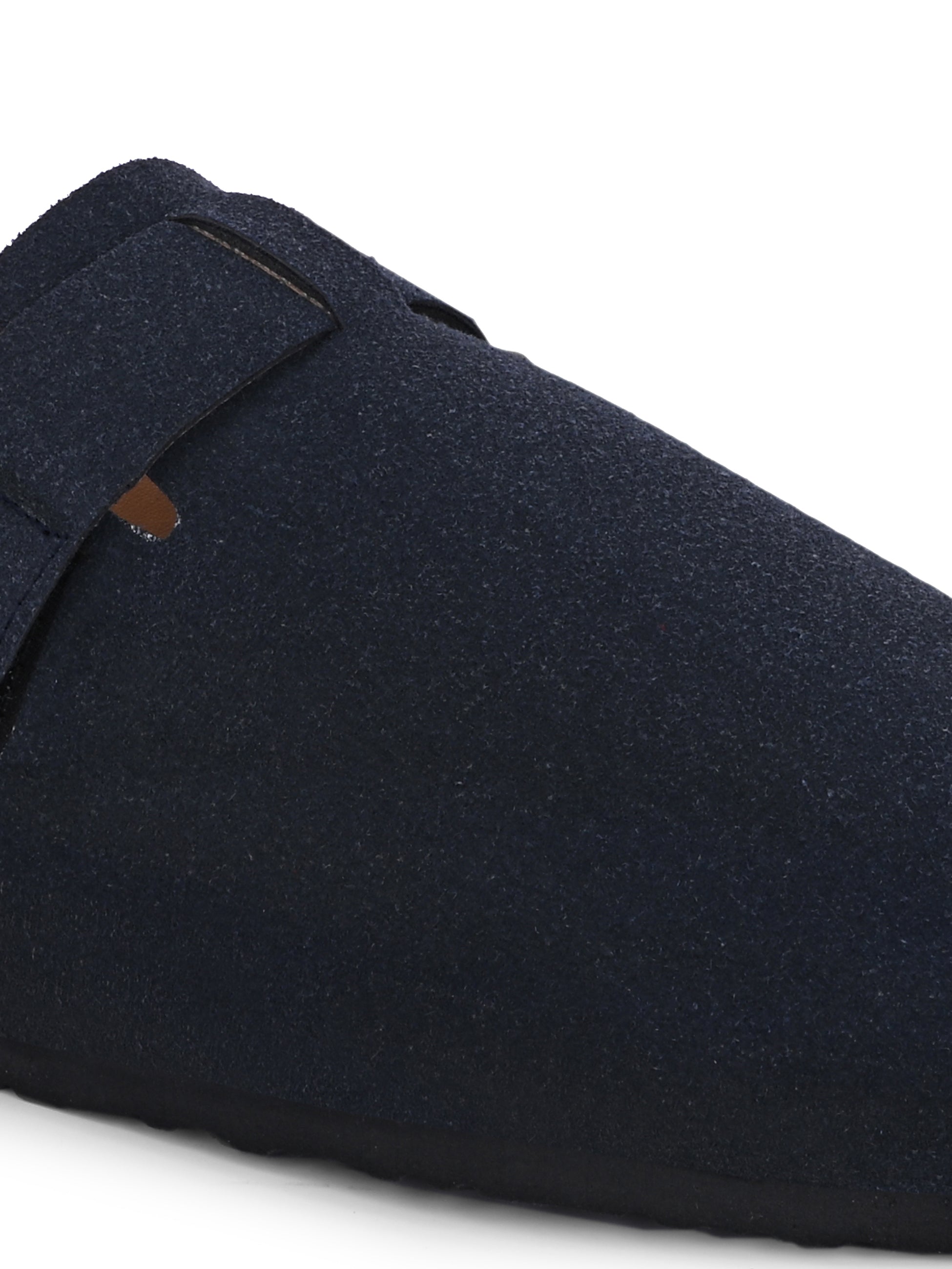 Blue suede slip-on clog with a black rubber sole and adjustable strap.