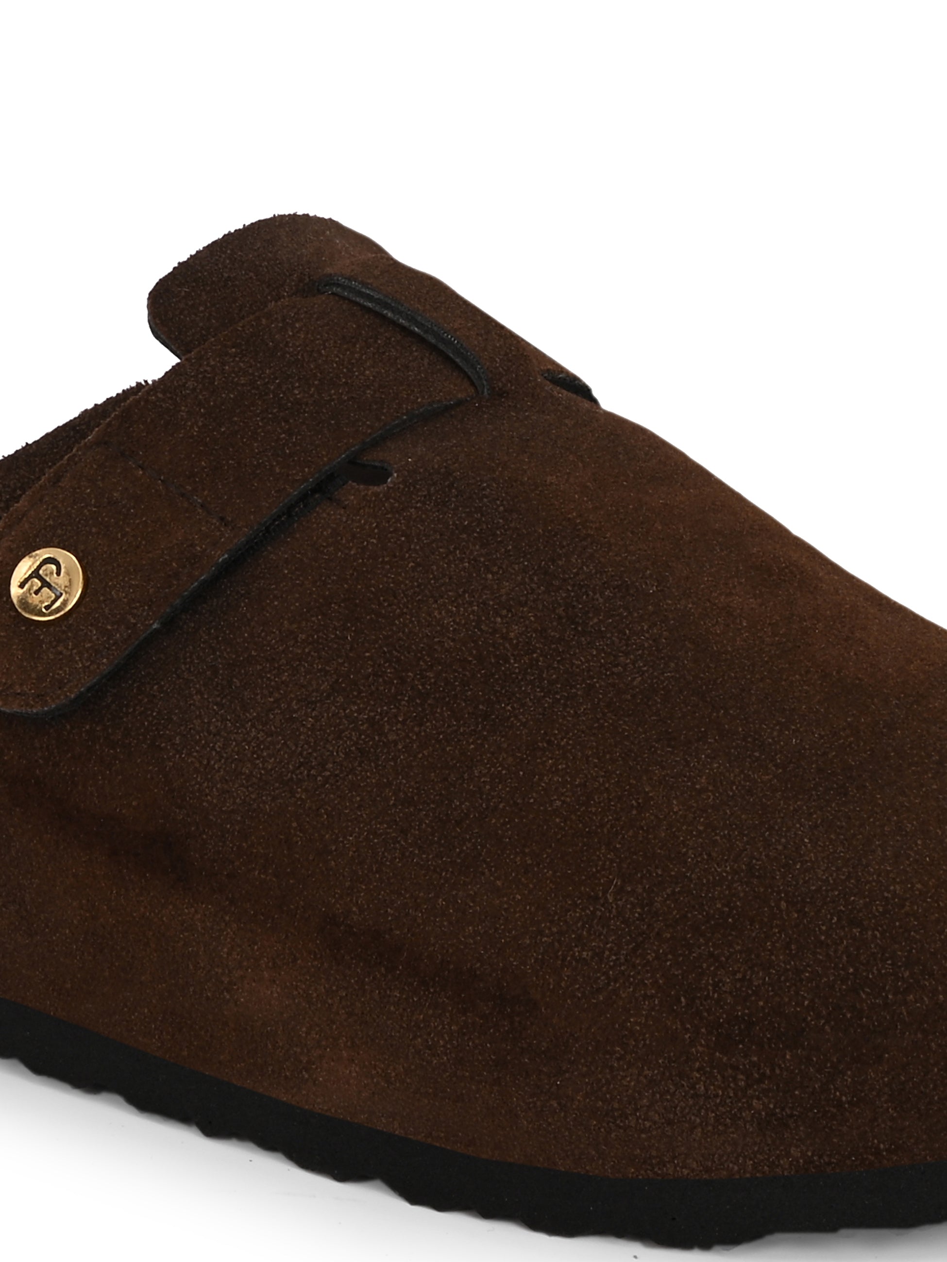 Brown suede slip-on clog with a black rubber sole and adjustable strap.