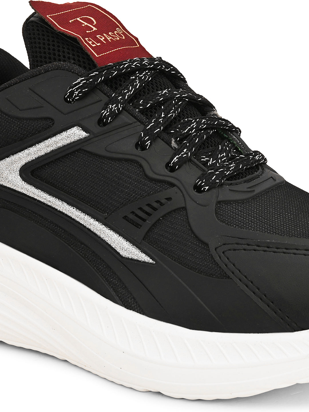 A black and white sneaker with a simple design.