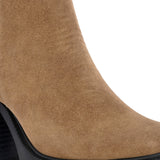 Glossy black patent leather ankle boot with a chunky block heel, lug sole, and a gold logo detail near the collar.